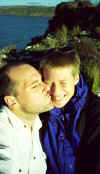 south_is_east_eric_pippa_kisses.jpg (26302 bytes)