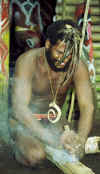 north_mal_making_fire.jpg (26930 bytes)