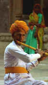 west_raj_jod_flute_player.jpg (24292 bytes)